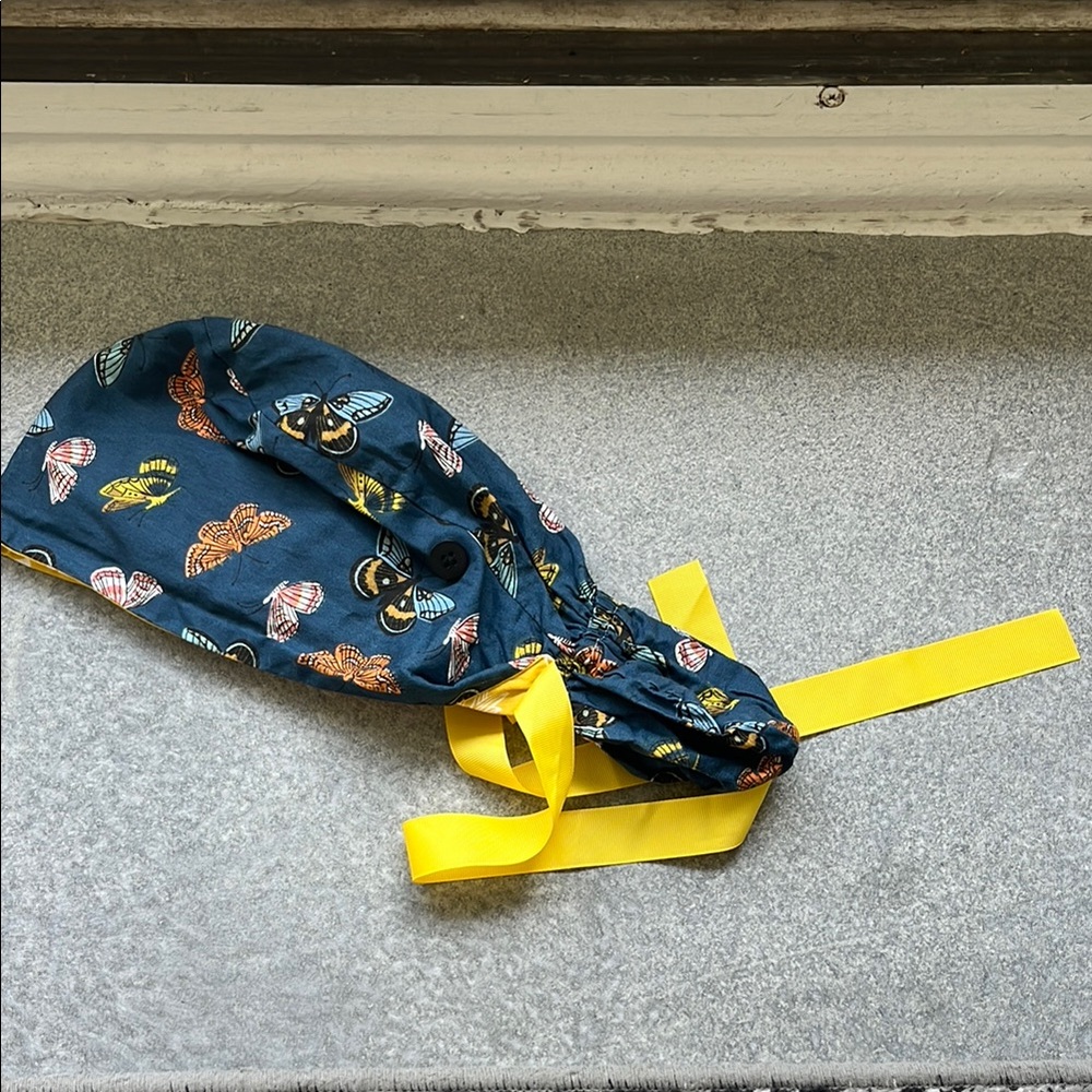 Surgical cap blue and yellow with butterflies